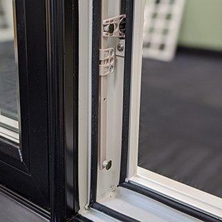 Low Quality Vinyl Window: Low locking point hardware - casement or an awning window features long tie bars