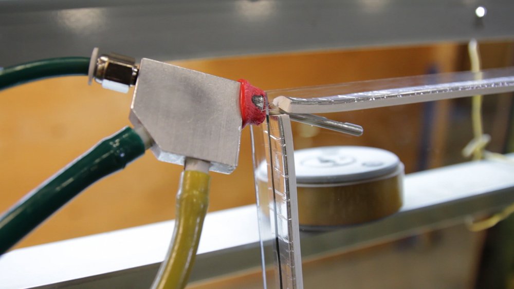 Gas is pumped into the glass unit before it is sealed.